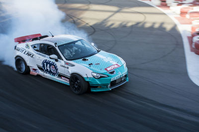 High angle view of sports car on track