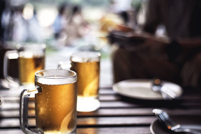 Close-up of beer glass on table