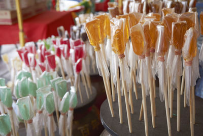 Close-up of candies wrapped in plastic for sale in market
