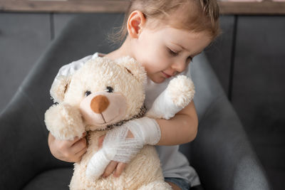 Cute girl with teddy bear