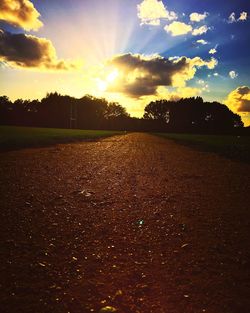Scenic view of landscape against cloudy sky