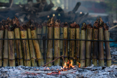 Close-up of bonfire on metal structure in winter