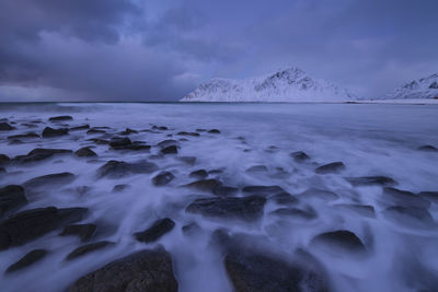 Scenic view of sea against sky during winter