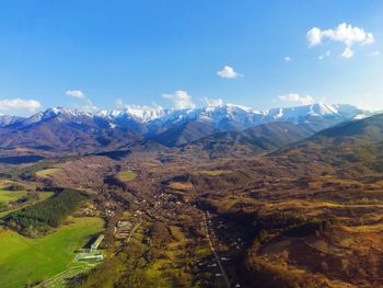 Scenic view of snowcapped mountain against sky