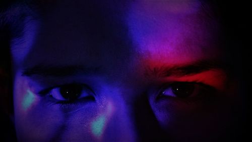 Close-up portrait of woman at home