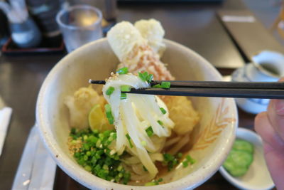 Close-up of soup served on table