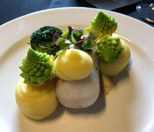 High angle view of fruits in plate on table