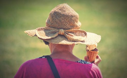 Rear view of woman wearing hat