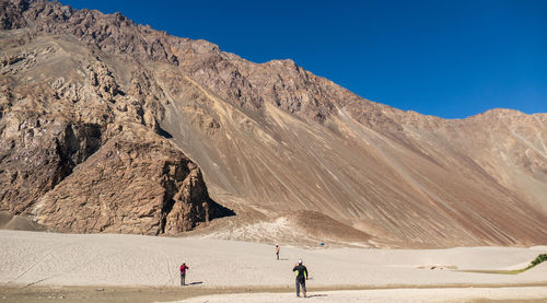 Scenic view of desert against clear sky