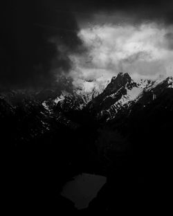 Scenic view of mountains against sky during winter