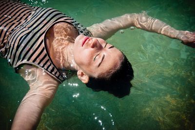 Young woman in water