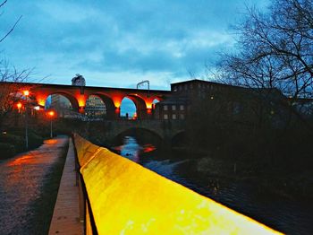 View of bridge against cloudy sky