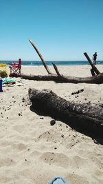 Scenic view of beach against clear sky