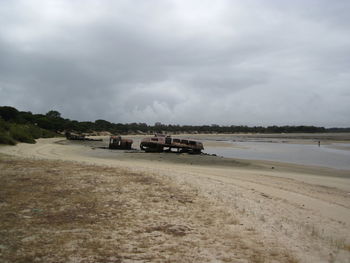 Scenic view of beach against sky