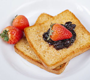 Close-up of strawberry cake on plate