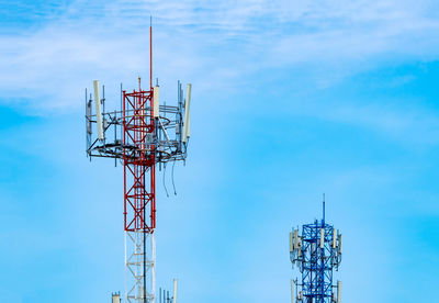 Low angle view of communications tower against sky