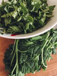 High angle view of chopped vegetables on leaves