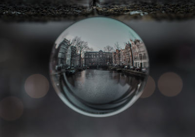 Close-up of crystal ball, amsterdam canals