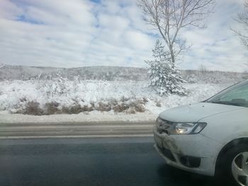 High angle view of road against cloudy sky