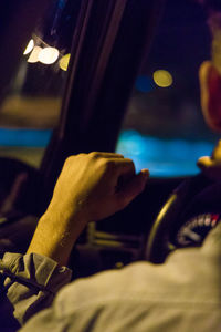 Close-up of man in car
