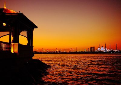 Scenic view of sea at sunset