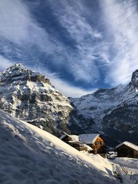 Scenic view of snowcapped mountains against sky