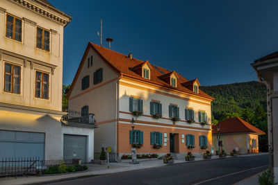 View of residential building against blue sky