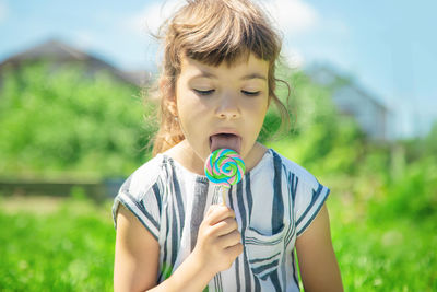 Portrait of boy blowing bubbles