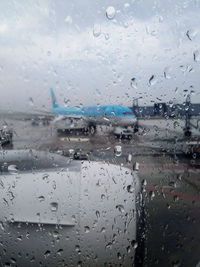 Full frame shot of wet glass window in rainy season