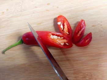 High angle view of tomatoes on cutting board