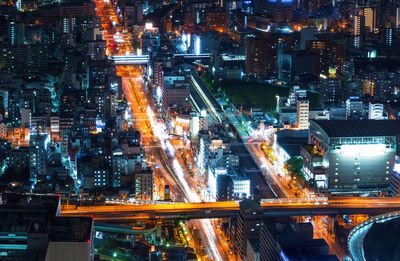 High angle view of illuminated cityscape at night