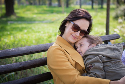 Woman with daughter at public park