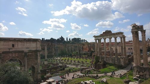 Panoramic view of historic building against cloudy sky