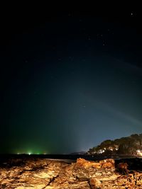 Scenic view of sea against sky at night