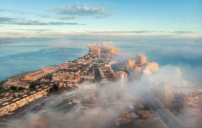 High angle view of city buildings at waterfront