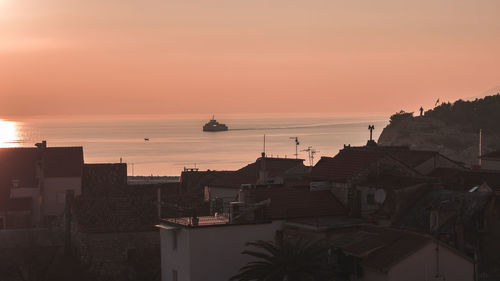 Scenic view of sea against sky at sunset