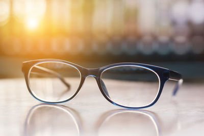 Close-up of sunglasses on table