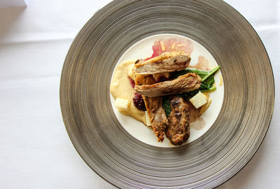 Close-up of food in plate on table