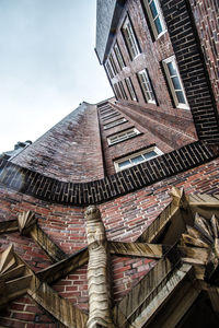 Directly below shot of residential building against sky