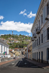 Buildings in city against sky