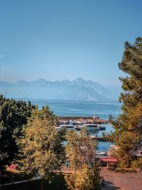 Scenic view of sea against clear blue sky