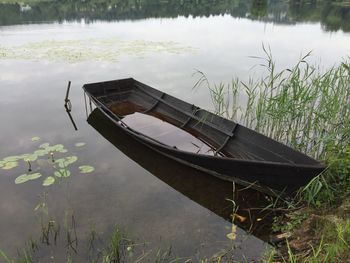 Boats in calm lake