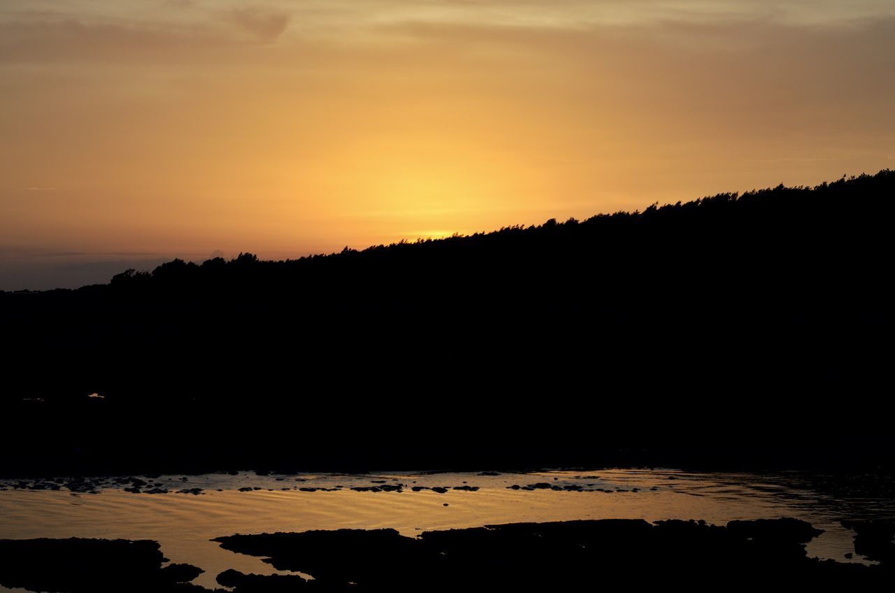 SCENIC VIEW OF SILHOUETTE LANDSCAPE DURING SUNSET