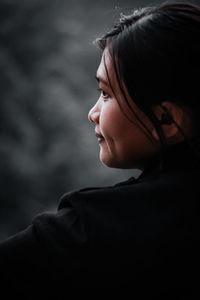 Portrait of woman looking away