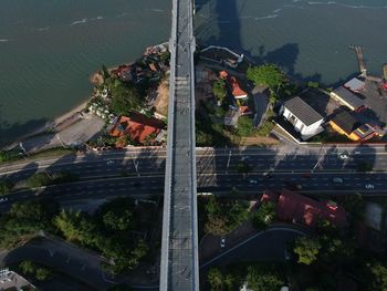 High angle view of buildings and trees in city