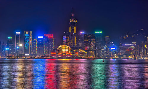 Illuminated buildings in city at night