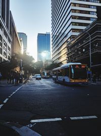 City street and buildings against sky