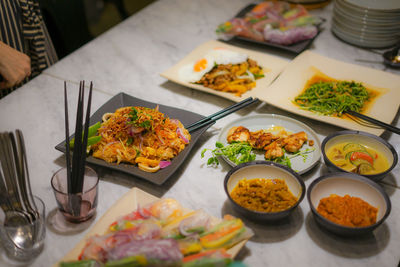 High angle view of food served on table