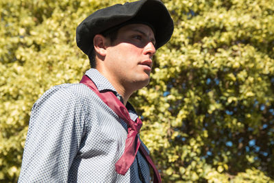 Handsome argentinian man wearing traditional clothing