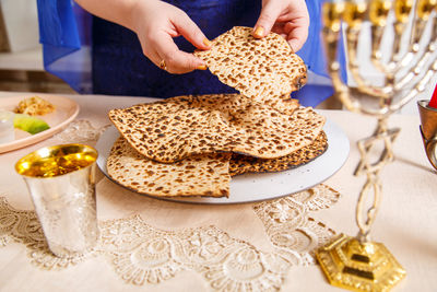 Midsection of woman holding food